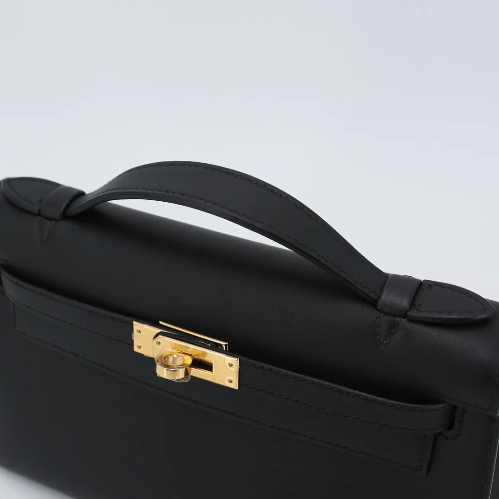 HERMÈS Kelly Pochette Black (89) Swift Gold hardware W (2024)