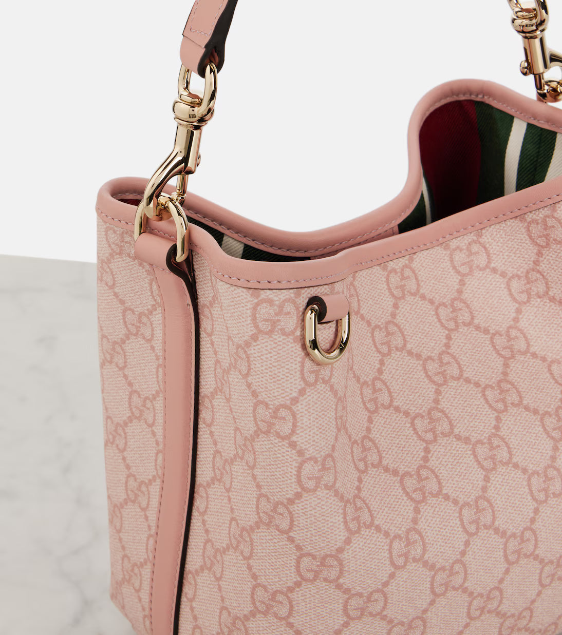 Gucci GG Emblem Mini leather-trimmed bucket bag 2025